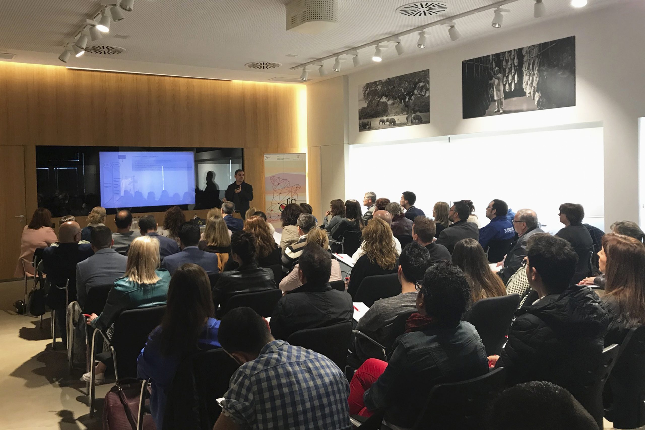 Grandmother And Granddaughter Baking In Kitchen
